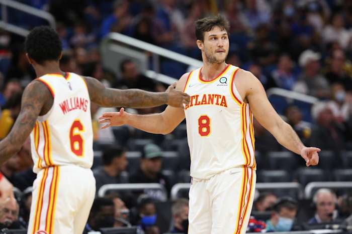 Atlanta Hawks forward Danilo Gallinari (8) celebrates with Atlanta Hawks guard Lou Williams (6) as he makes a three point basket against the Orlando Magic during the second half at Amway Center.